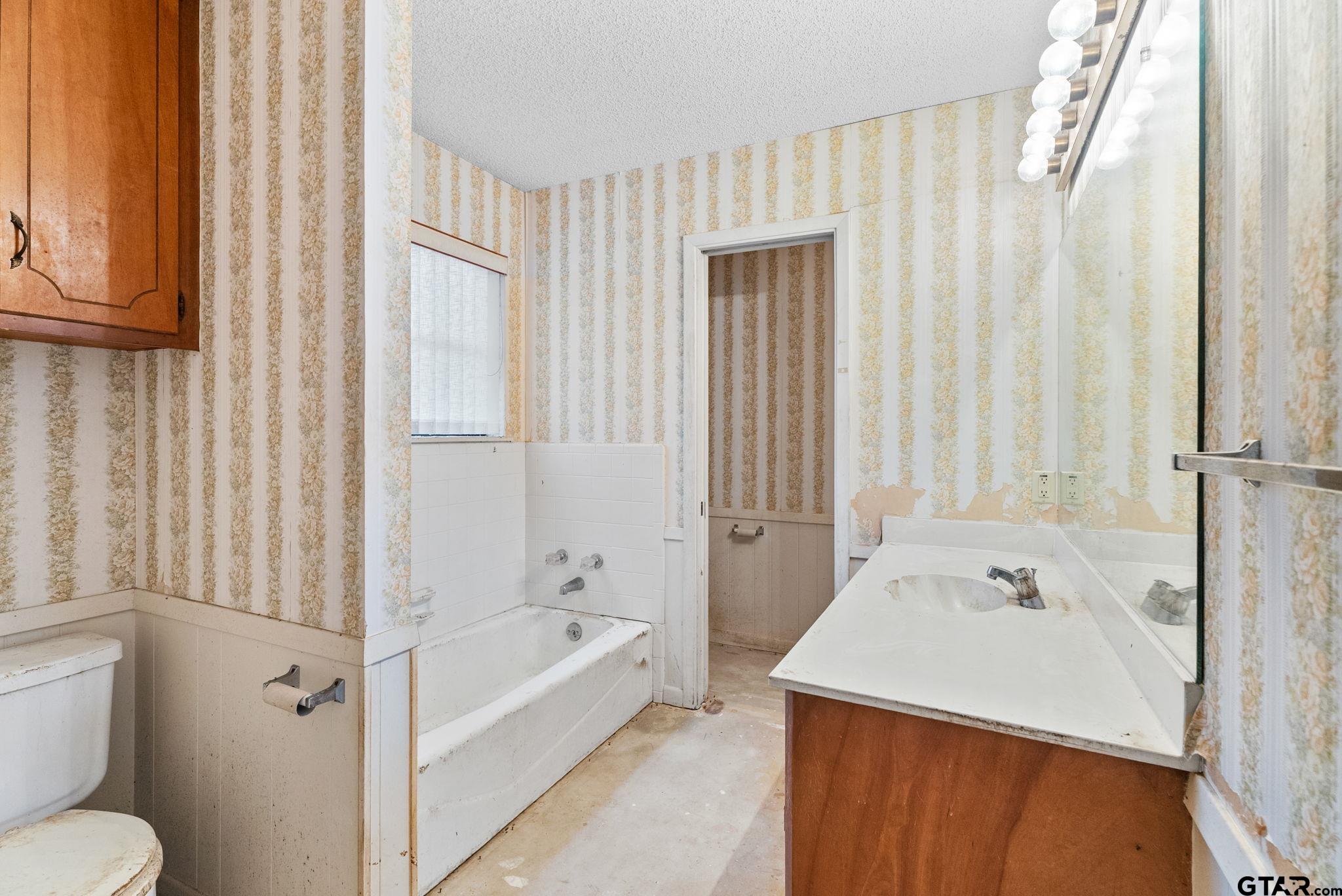 21135 County Road 1291 Flint, TX 75762 - Photo 20 of 25 a bathroom with a sink a toilet and shower