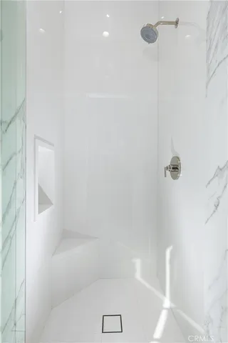 a utility room with sink dryer and washer