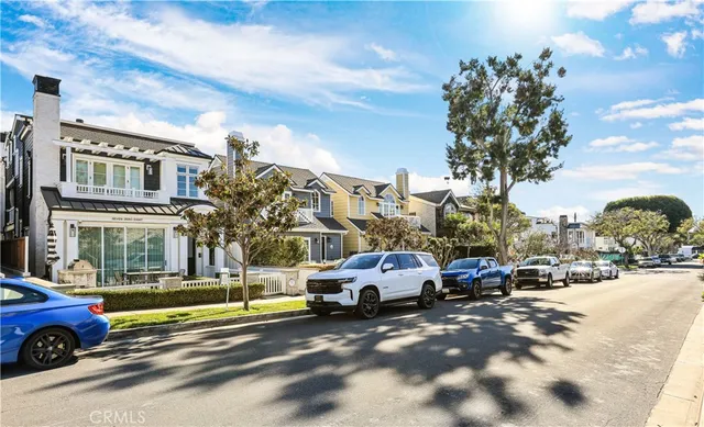 a building outdoor space with patio furniture and potted plants