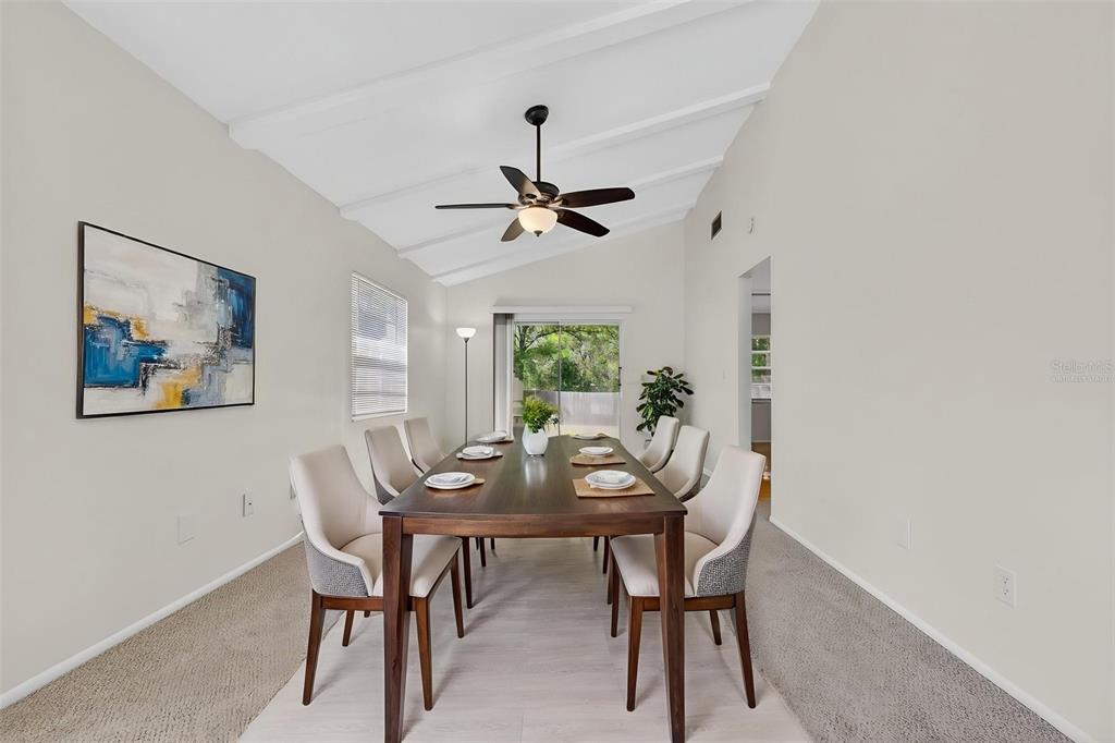 4915 Billy Direct Lane Lutz, FL 33559 - Photo 25 of 73 a dining room with furniture and window
