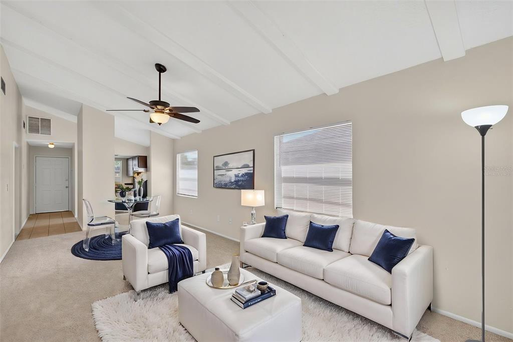 4915 Billy Direct Lane Lutz, FL 33559 - Photo 28 of 73 a living room with furniture and a wooden floor