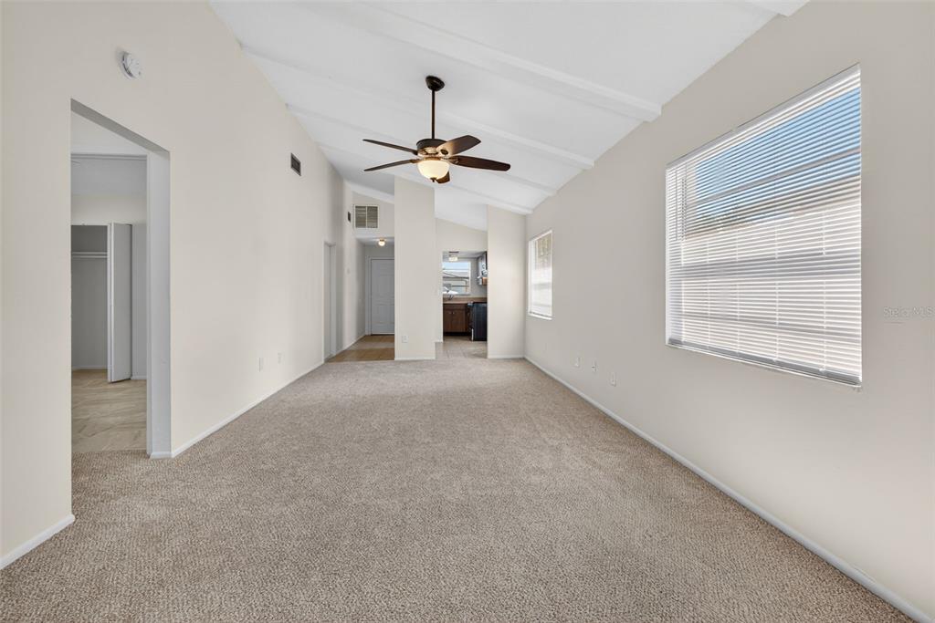 4915 Billy Direct Lane Lutz, FL 33559 - Photo 29 of 73 a view of a livingroom with a ceiling fan and window
