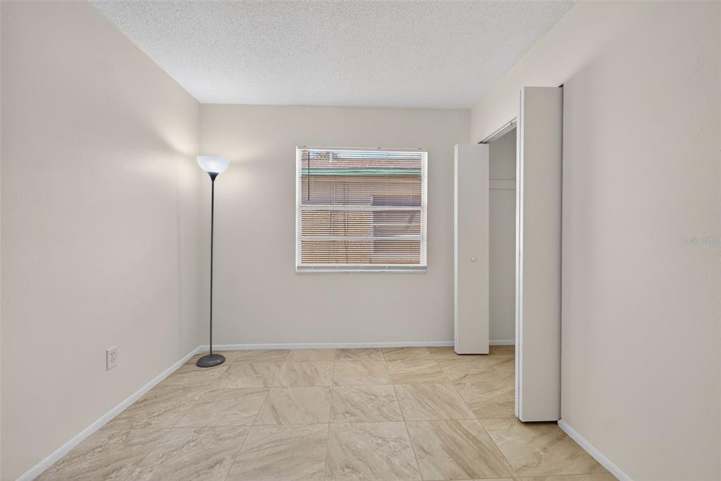 4915 Billy Direct Lane Lutz, FL 33559 - Photo 34 of 73 an empty room with windows