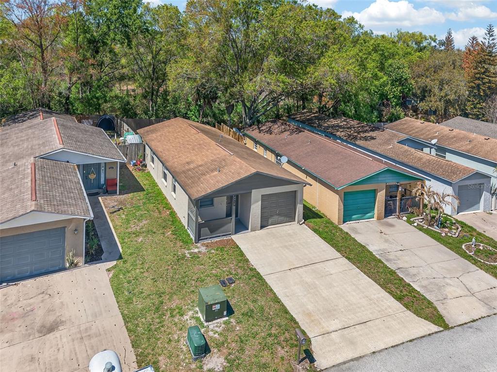 4915 Billy Direct Lane Lutz, FL 33559 - Photo 55 of 73 an aerial view of a house with a yard