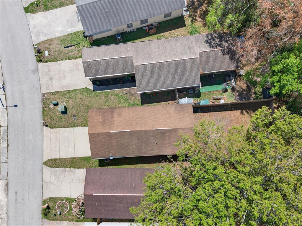 4915 Billy Direct Lane Lutz, FL 33559 - Photo 58 of 73 an aerial view of a house with a yard and large tree
