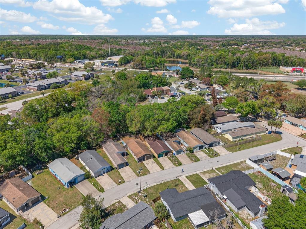 4915 Billy Direct Lane Lutz, FL 33559 - Photo 65 of 73 an aerial view of a house with a lake view