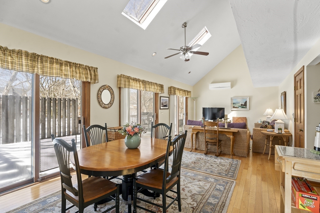 52 Windsor Drive Edgartown, MA 02539 - Photo 4 of 11 a view of a dining room with furniture window and wooden floor