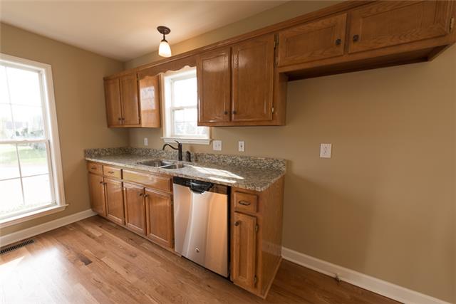 2916 Torrence Trail Spring Hill, TN 37174 - Photo 5 of 12 NEW UPDATED PLUMBING AND NEW GRANITE COUNTERTOPS AND FLOORING. CURRENT PHOTO AS OF 1/10/16