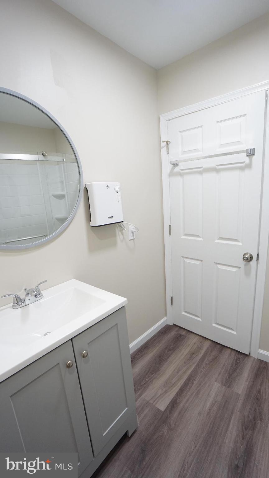 104 Bethlehem Pike, Unit B Colmar, PA 19446 - Photo 11 of 12 a room with a sink and a mirror