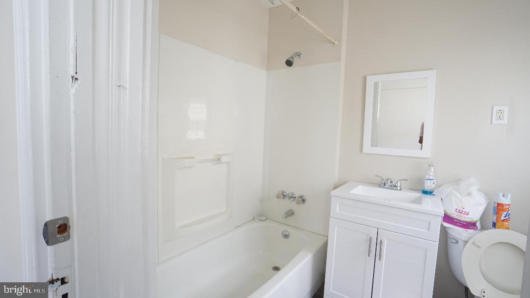 104 Bethlehem Pike, Unit B Colmar, PA 19446 - Photo 6 of 12 a bathroom with a sink vanity mirror and toilet