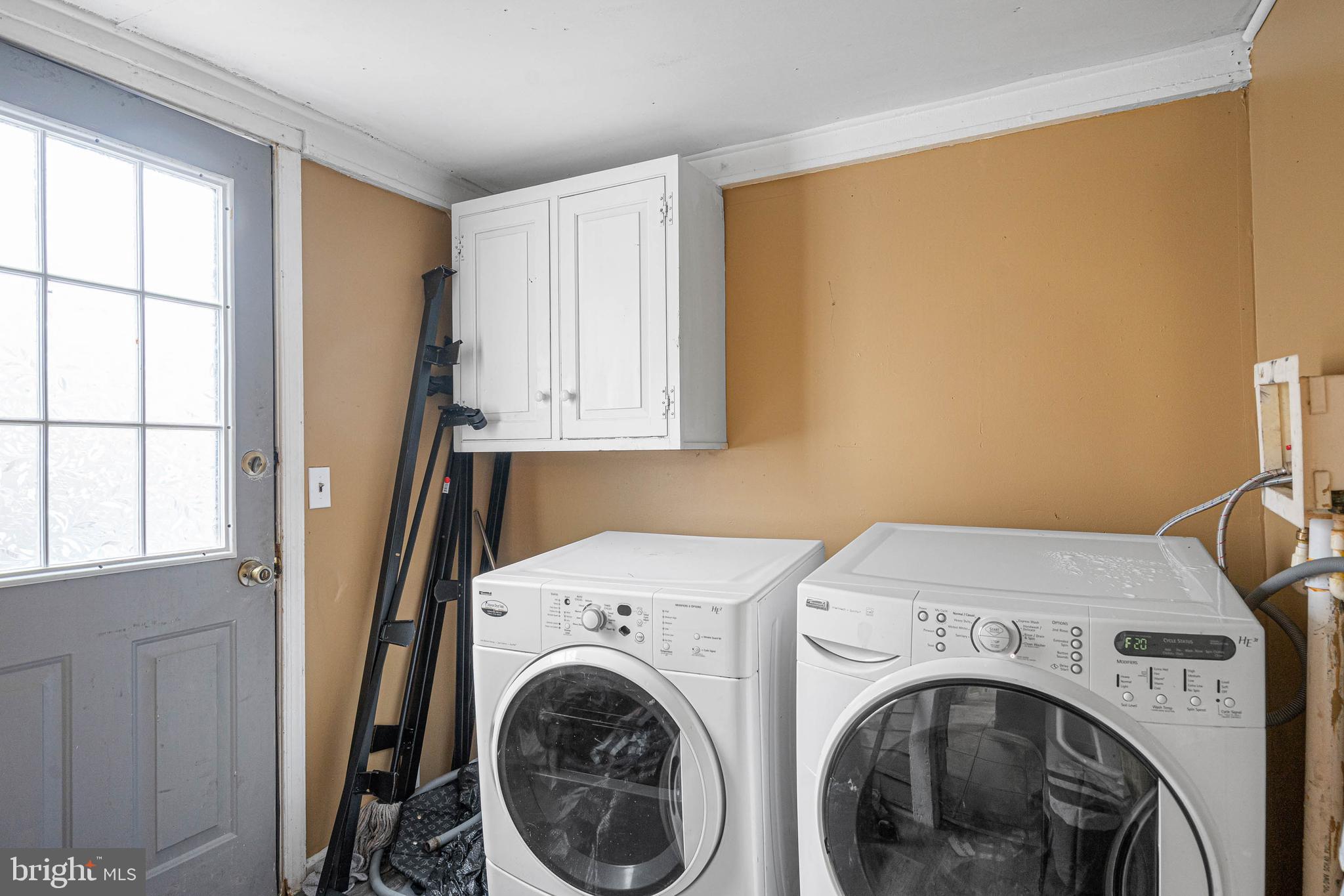 412 East State Street Delmar, MD 21875 - Photo 18 of 36 a view of storage and utility room with washer and dryer