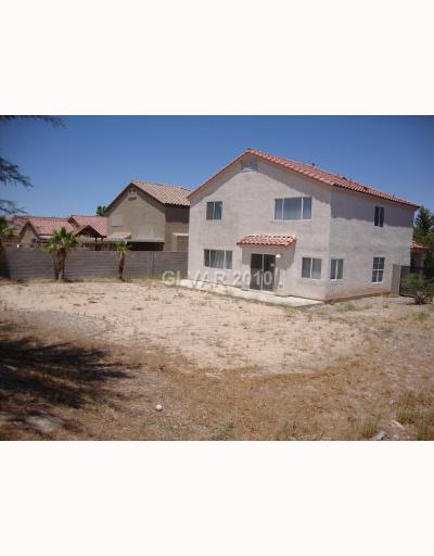 993 Ridge Path Avenue Henderson, NV 89015 - Photo 10 of 11 Exterior Back. Lots of room to make your own. Fully fenced.