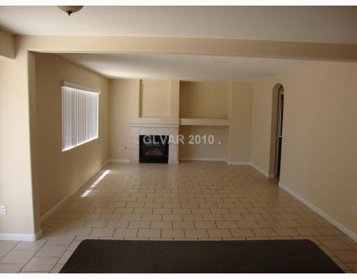 993 Ridge Path Avenue Henderson, NV 89015 - Photo 3 of 11 Interior Space/Layout. Family Room off kitchen and laundry room