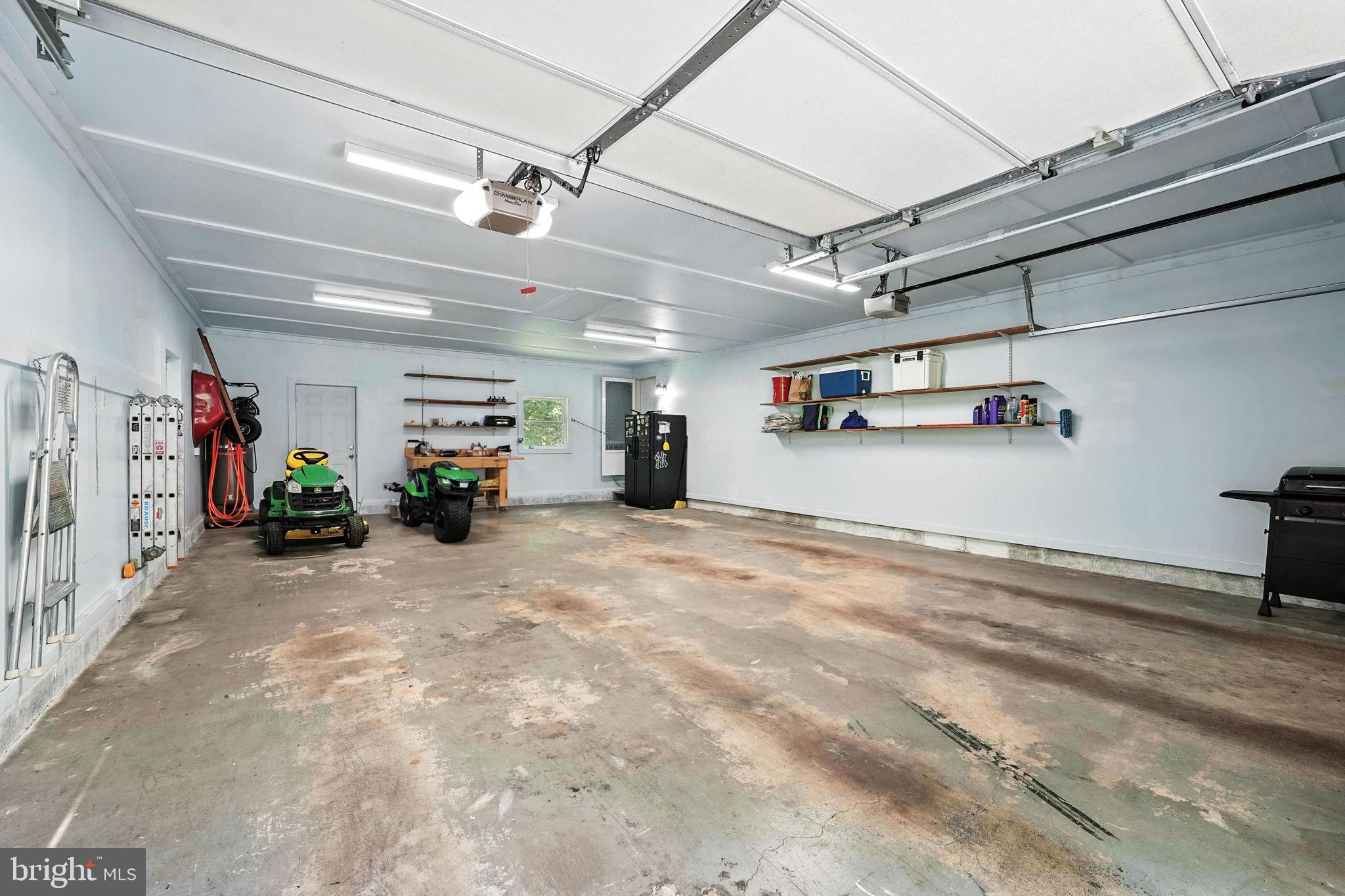 10282 Greystone Road Manassas, VA 20111 - Photo 20 of 44 4 car garage: fridge/ air compressor/ work bench