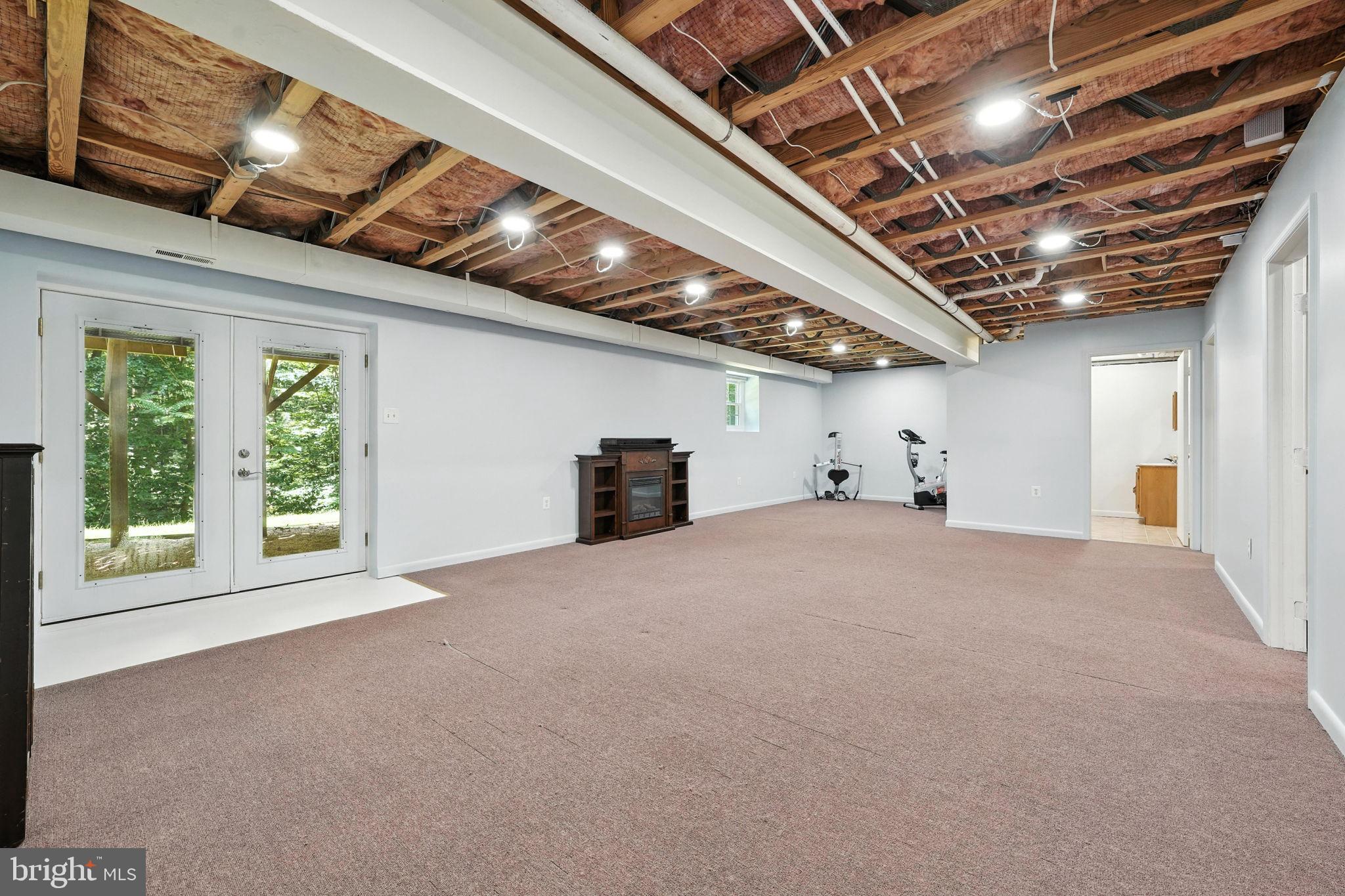 10282 Greystone Road Manassas, VA 20111 - Photo 33 of 44 Spacious recreation room walk out to yard