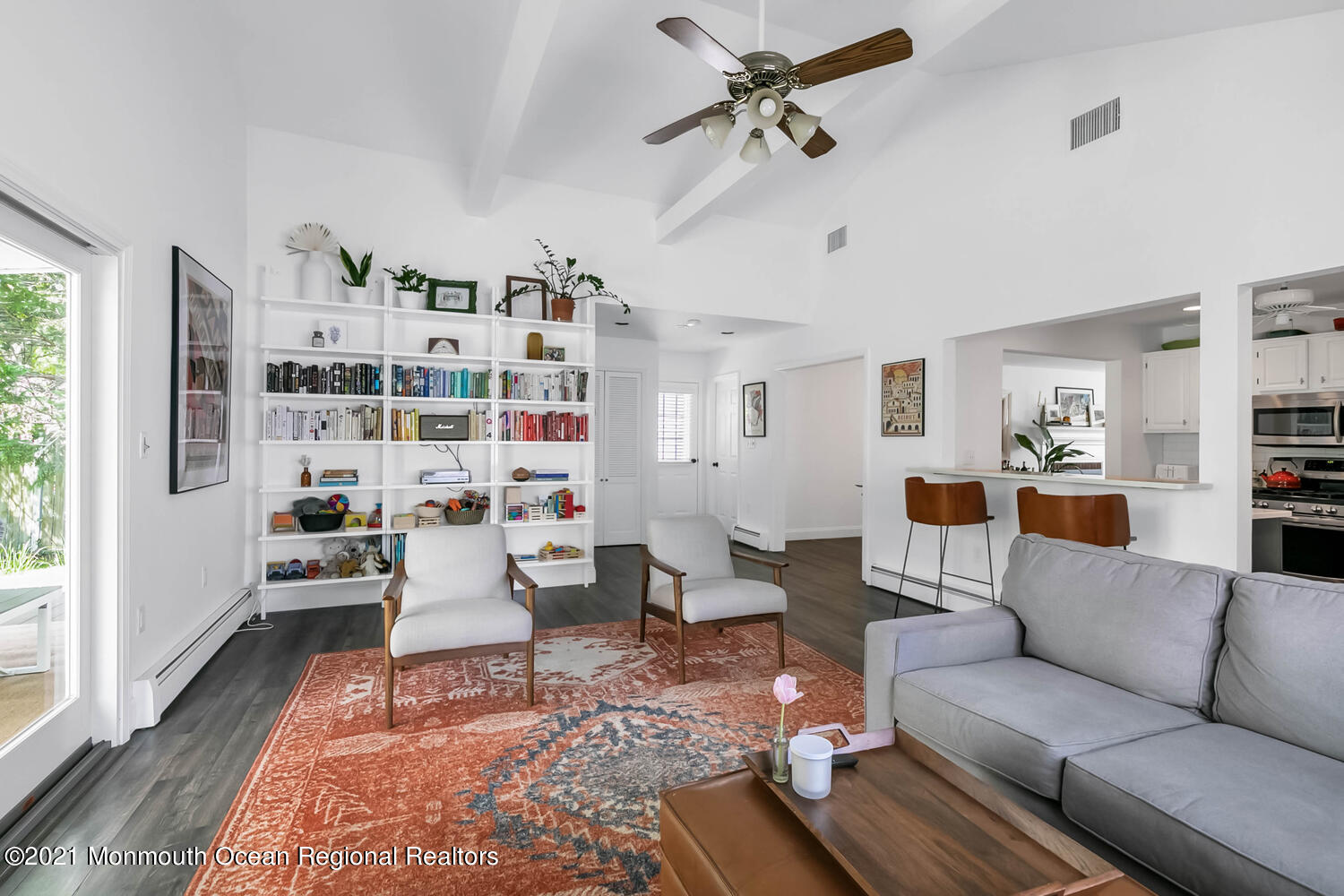 114 Garden Road Shrewsbury, NJ 07702 - Photo 11 of 25 a living room with furniture or couch and a bookshelf