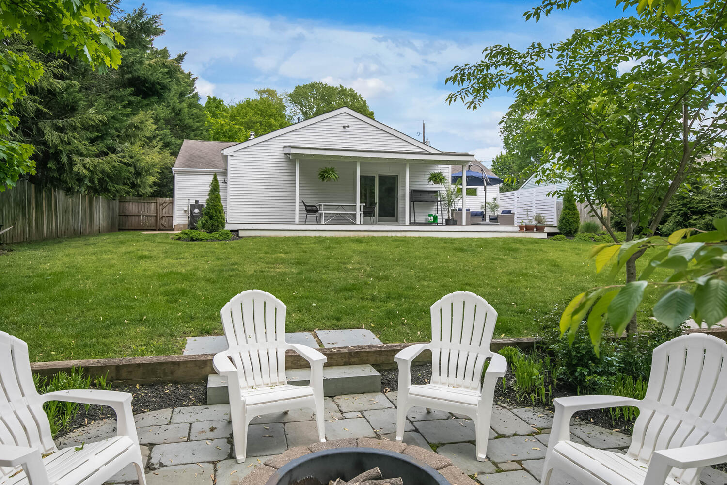 114 Garden Road Shrewsbury, NJ 07702 - Photo 20 of 25 a front view of a house with garden