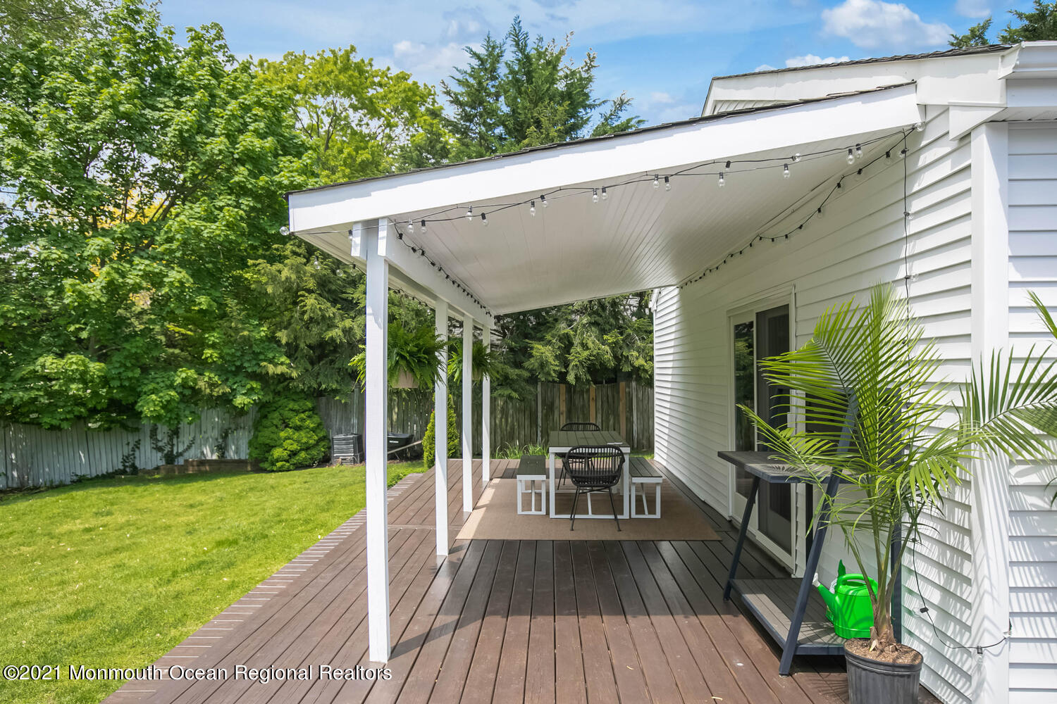 114 Garden Road Shrewsbury, NJ 07702 - Photo 21 of 25 a view of outdoor space yard deck patio and swimming pool