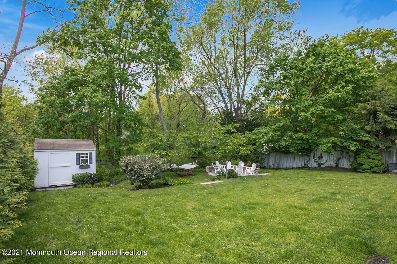 114 Garden Road Shrewsbury, NJ 07702 - Photo 23 of 25 a view of a backyard with a garden