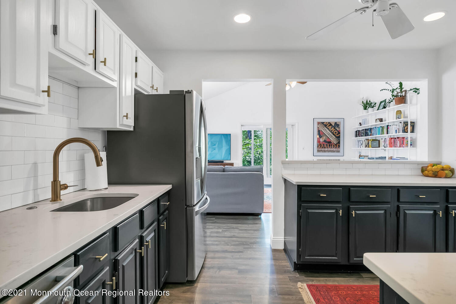 114 Garden Road Shrewsbury, NJ 07702 - Photo 7 of 25 a kitchen with stainless steel appliances granite countertop a sink a stove and a refrigerator