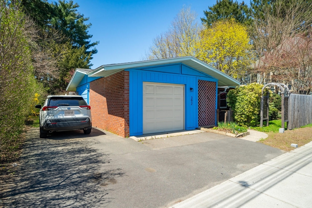 392 Bridge Street Northampton, MA 01060 - Photo 1 of 36 a view of a house with a yard