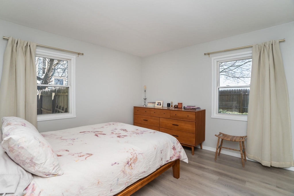 392 Bridge Street Northampton, MA 01060 - Photo 14 of 36 a bedroom with a bed and a window