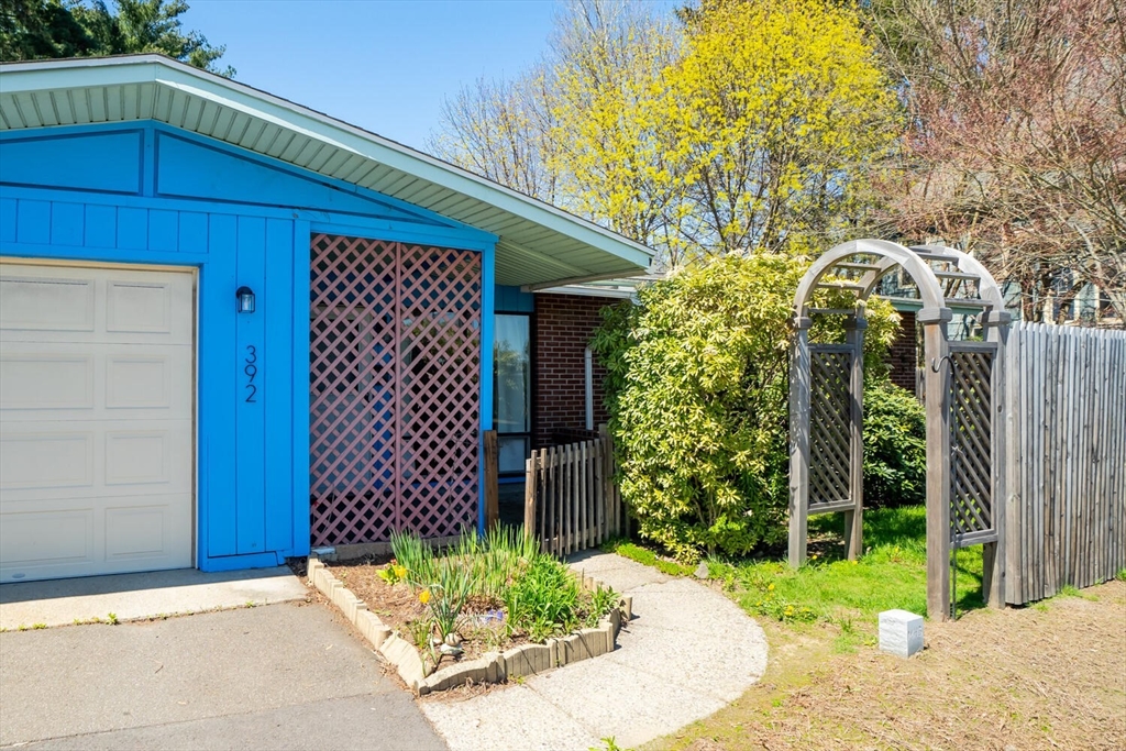 392 Bridge Street Northampton, MA 01060 - Photo 2 of 36 a view of a house with a small yard