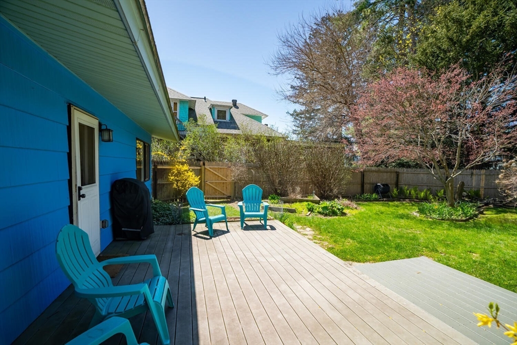 392 Bridge Street Northampton, MA 01060 - Photo 25 of 36 a view of a table and chairs in patio with a yard