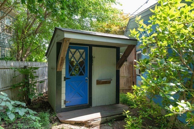 392 Bridge Street Northampton, MA 01060 - Photo 32 of 36 a house with trees in front of it