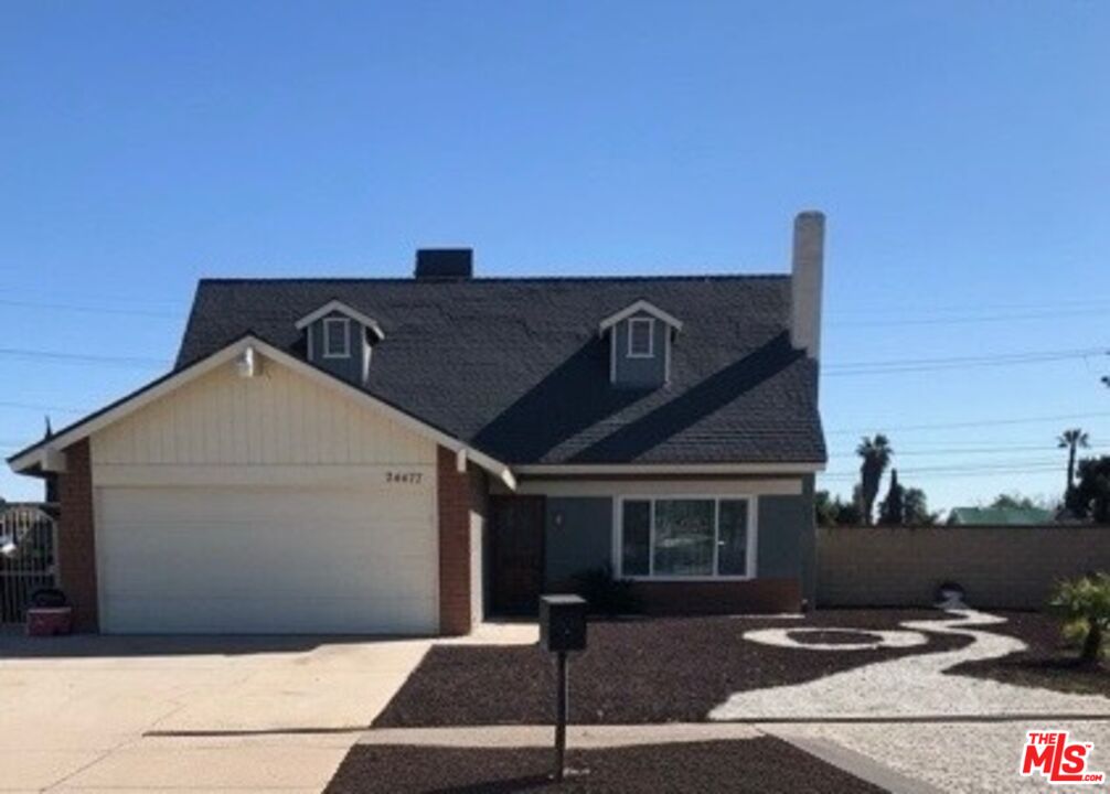 24477 Oneida Street Moreno Valley, CA 92553 - Photo 1 of 1 a front view of a house with garage