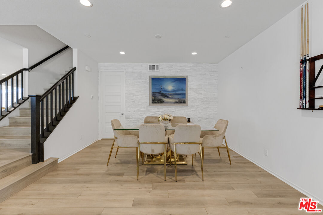 24477 Oneida Street Moreno Valley, CA 92553 - Photo 11 of 51 a dining room with furniture and window