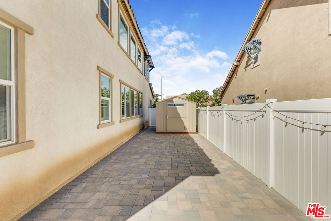 24477 Oneida Street Moreno Valley, CA 92553 - Photo 36 of 51 a view of a house with a yard