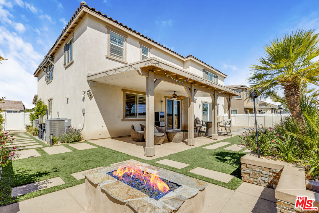 24477 Oneida Street Moreno Valley, CA 92553 - Photo 39 of 51 a front view of a house with garden