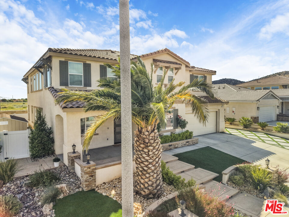 24477 Oneida Street Moreno Valley, CA 92553 - Photo 43 of 51 a front view of a house with garden