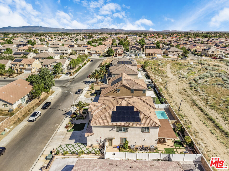 24477 Oneida Street Moreno Valley, CA 92553 - Photo 48 of 51 an aerial view of residential houses with outdoor space