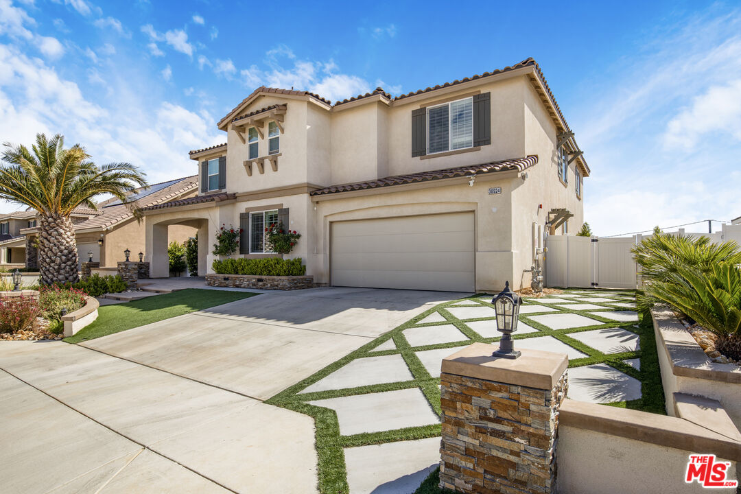 24477 Oneida Street Moreno Valley, CA 92553 - Photo 5 of 51 a front view of a house with garden