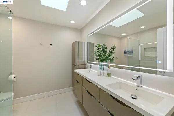 an aerial view of a house with outdoor space