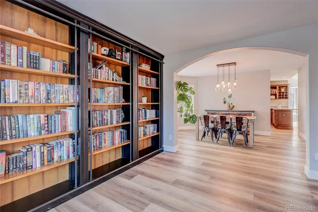 a view of a workspace with furniture and staircase