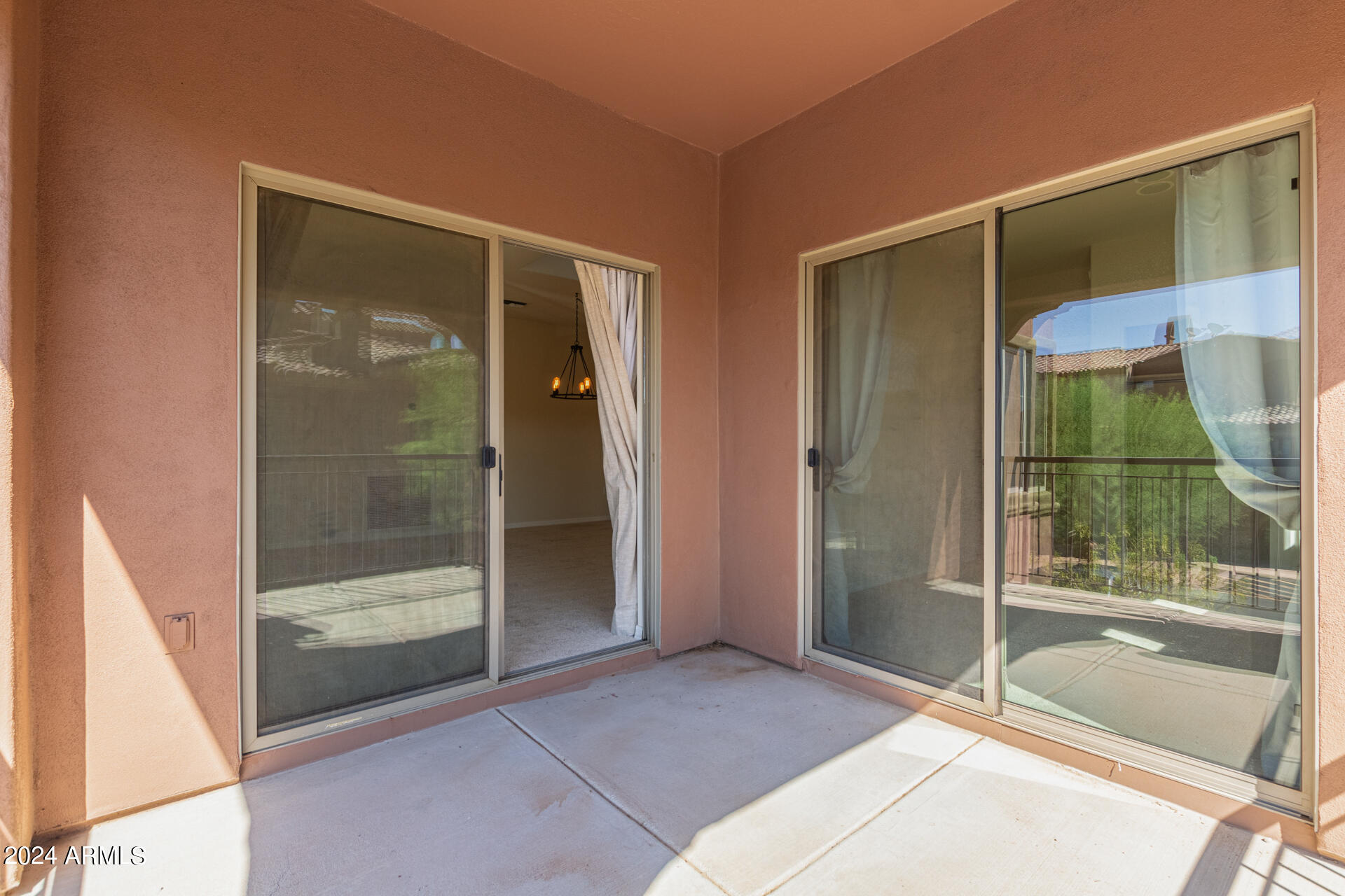3935 East Rough Rider Road, Unit 1165 Phoenix, AZ 85050 - Photo 33 of 40 ACCESS THROUGH GREAT ROOM AND BEDROOM 2