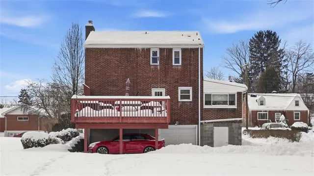 a street sign on a pole on a street