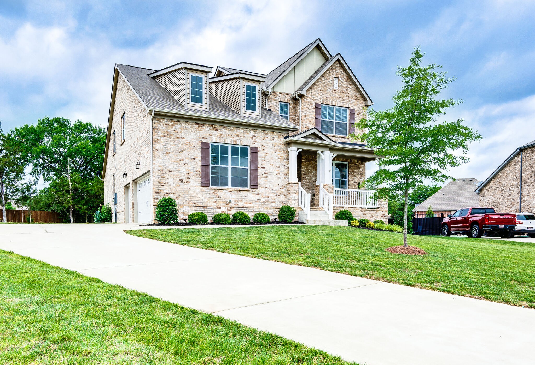 12 Kelly Court Lebanon, TN 37087 - Photo 2 of 55 a front view of a house with a yard and garage