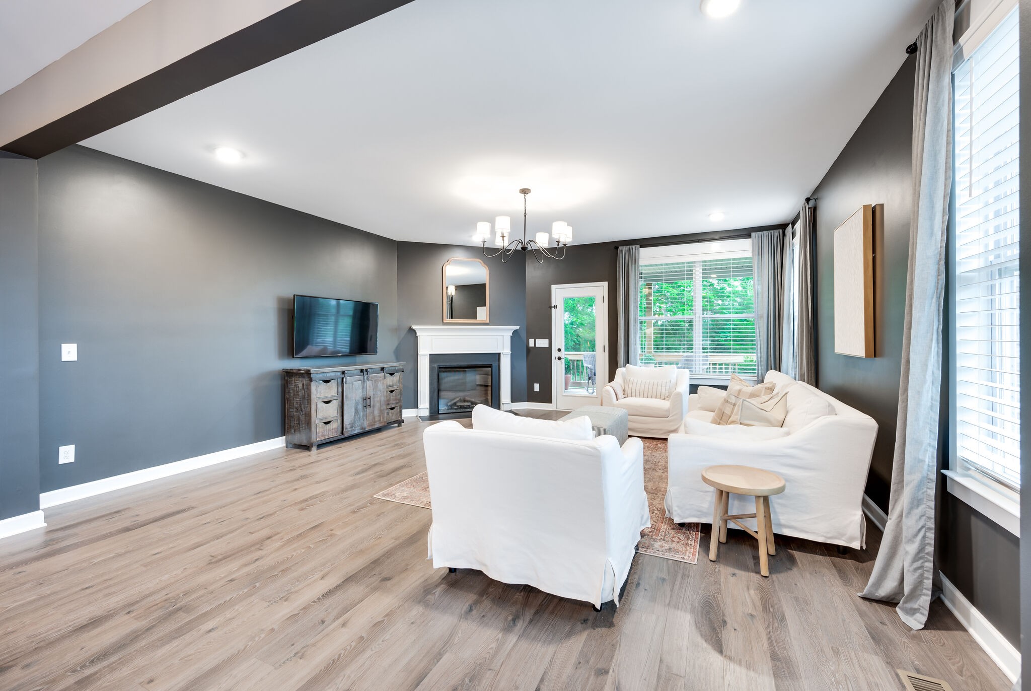 12 Kelly Court Lebanon, TN 37087 - Photo 26 of 55 a living room with fireplace furniture flat screen tv and wooden floor