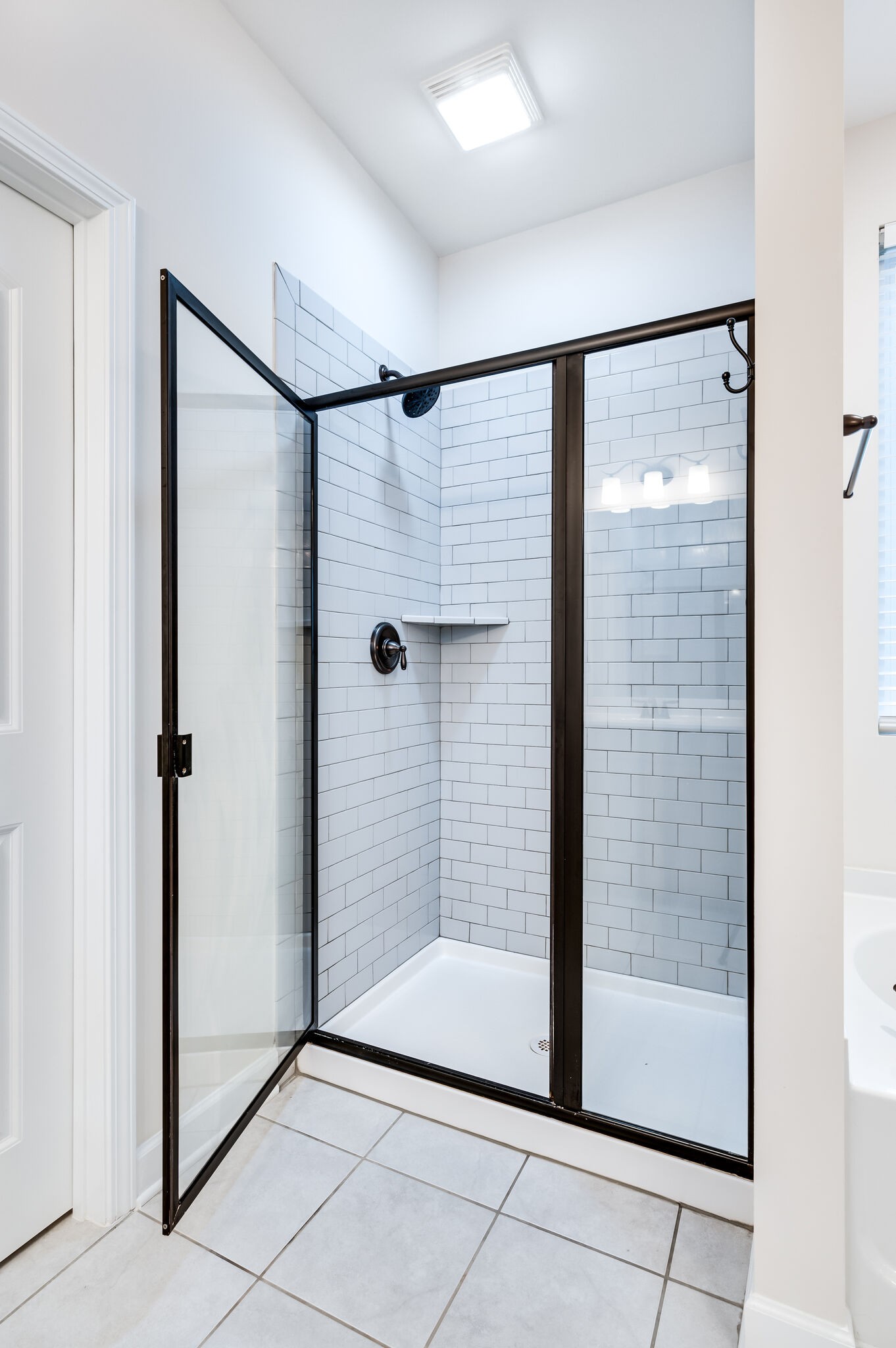 12 Kelly Court Lebanon, TN 37087 - Photo 35 of 55 a bathroom with a glass shower door
