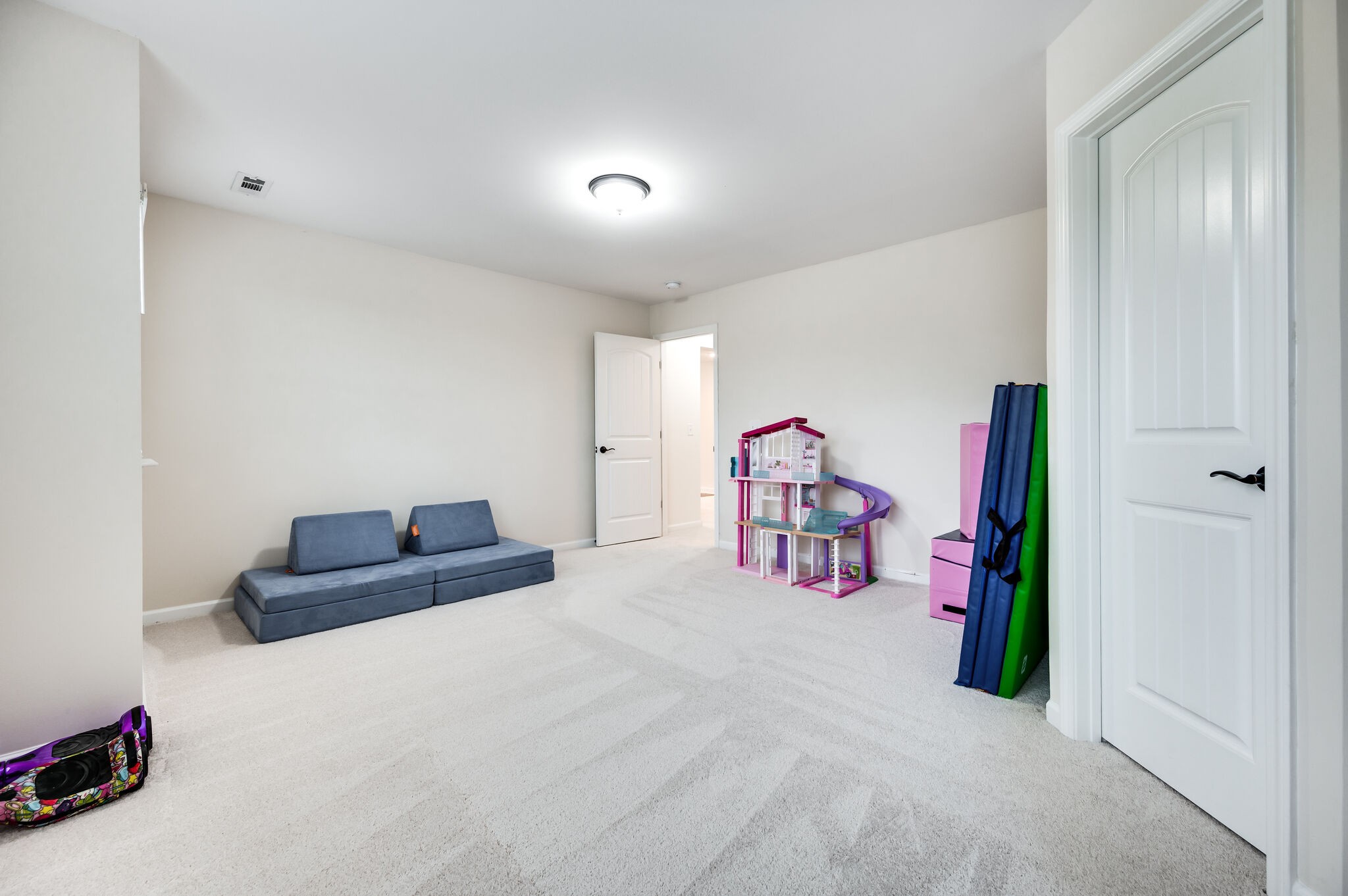 12 Kelly Court Lebanon, TN 37087 - Photo 47 of 55 a hallway with a bed and a couch