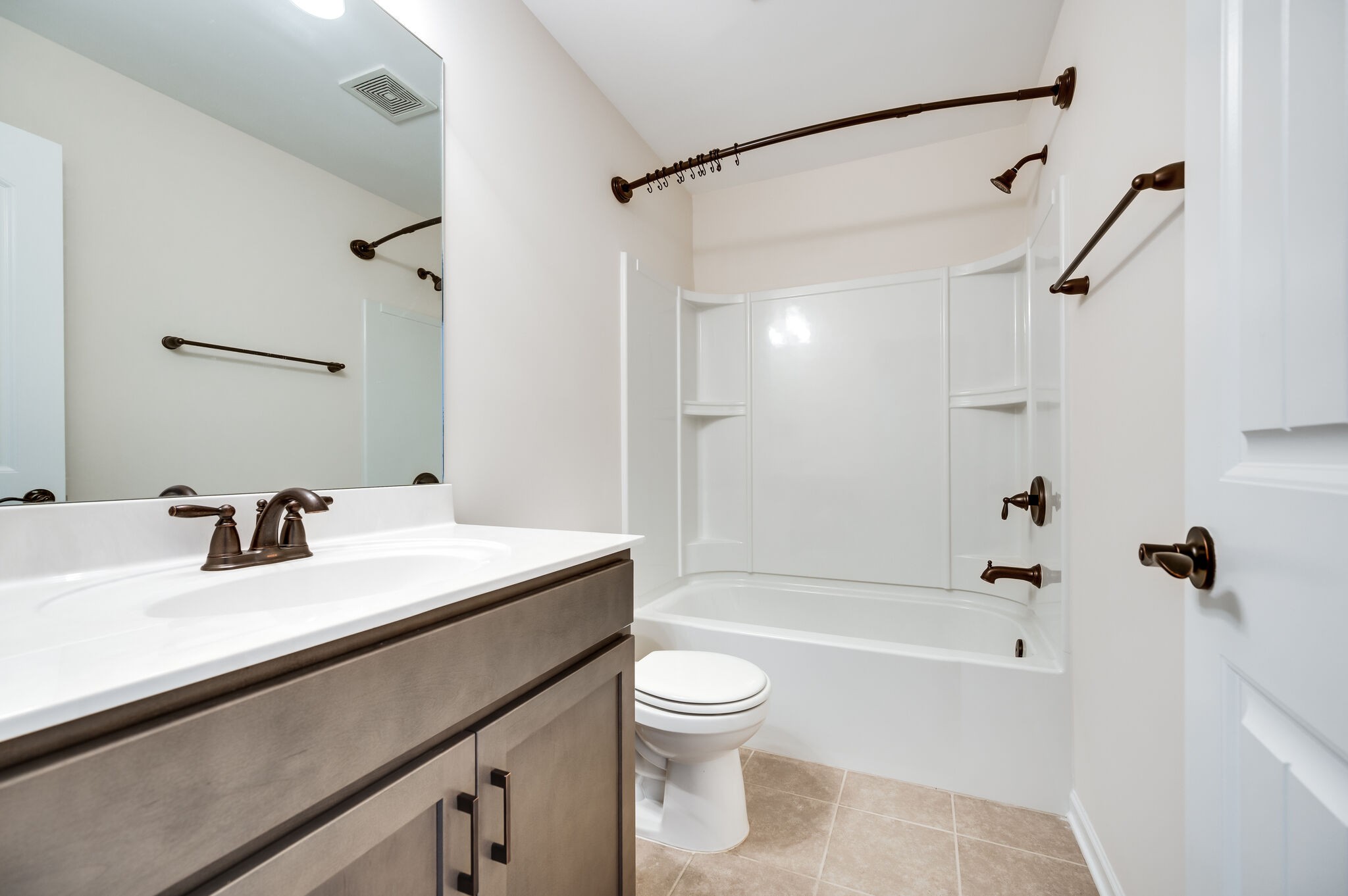 12 Kelly Court Lebanon, TN 37087 - Photo 50 of 55 a bathroom with a sink a toilet and a mirror