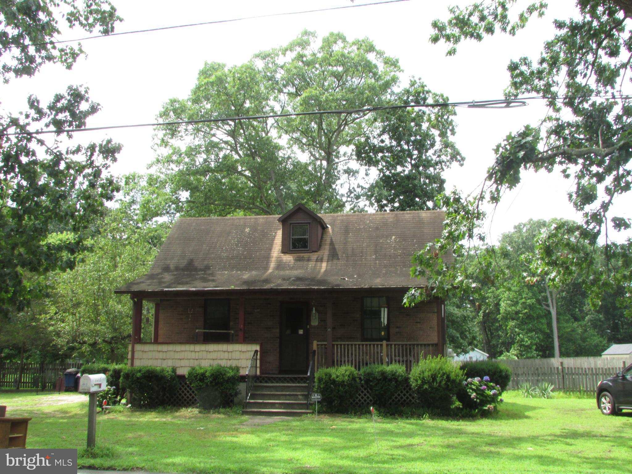 1215 Bridgeboro Road Edgewater Park, NJ 08010 - Photo 13 of 13 a front view of a house with a garden