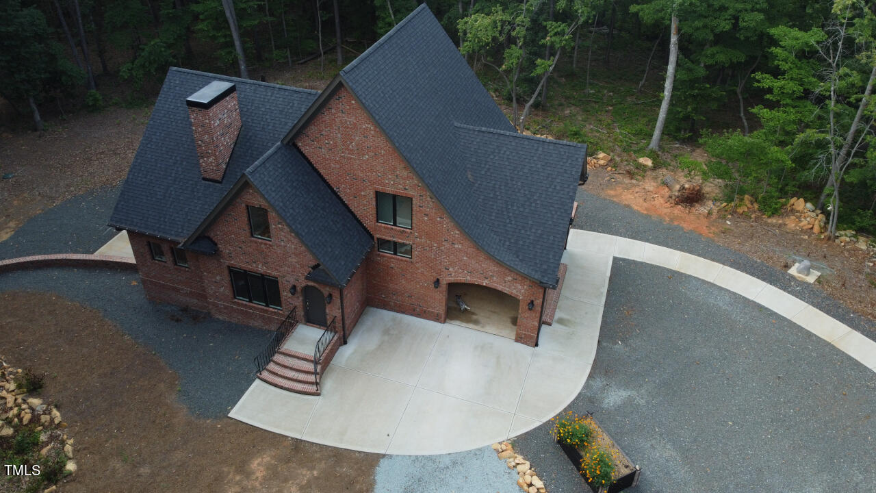 804 Crabtree Glenn Road Rougemont, NC 27572 - Photo 12 of 66 an aerial view of a house with couches and wooden floor