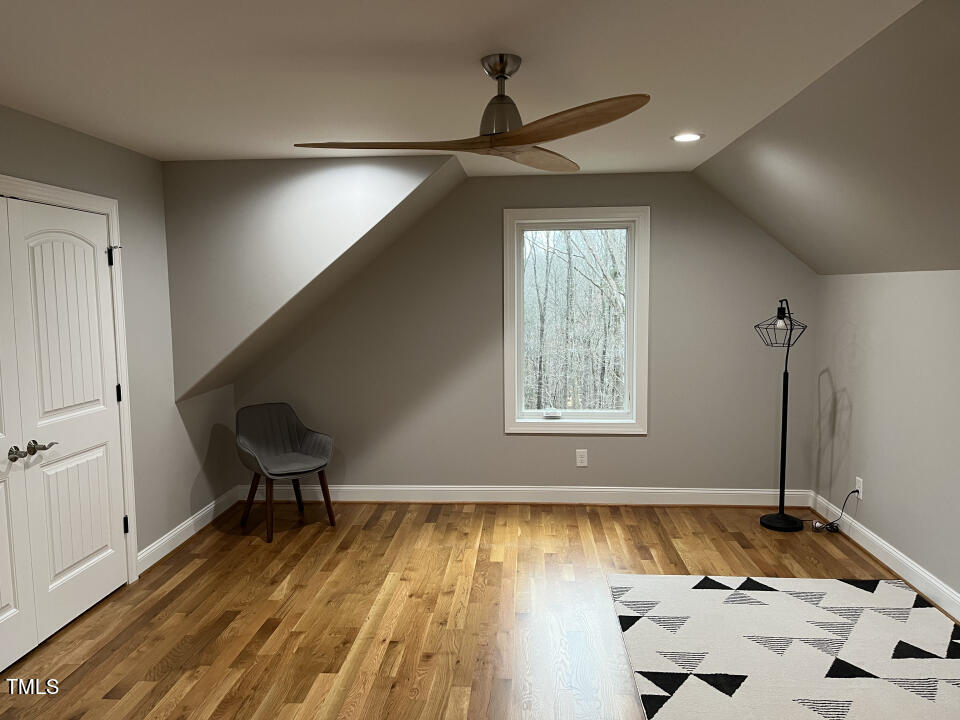 804 Crabtree Glenn Road Rougemont, NC 27572 - Photo 40 of 66 a room with bed and wooden floor