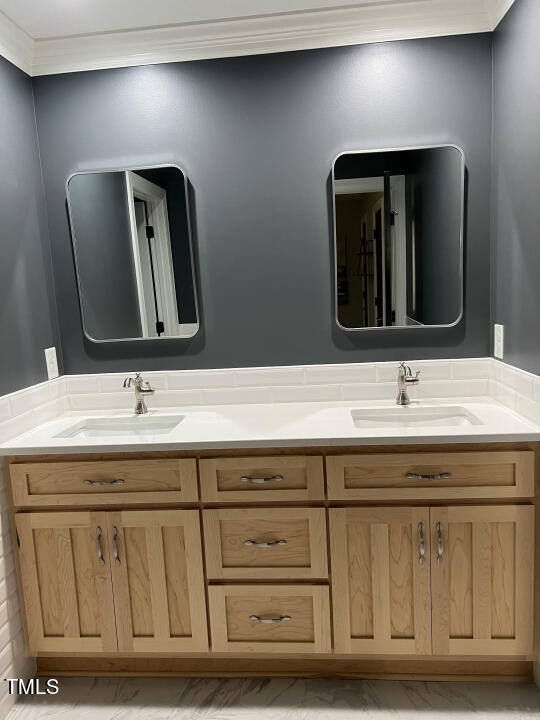804 Crabtree Glenn Road Rougemont, NC 27572 - Photo 45 of 66 a bathroom with a double vanity sink and a mirror