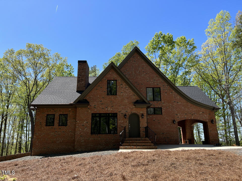 804 Crabtree Glenn Road Rougemont, NC 27572 - Photo 6 of 66 a front view of a house with a yard